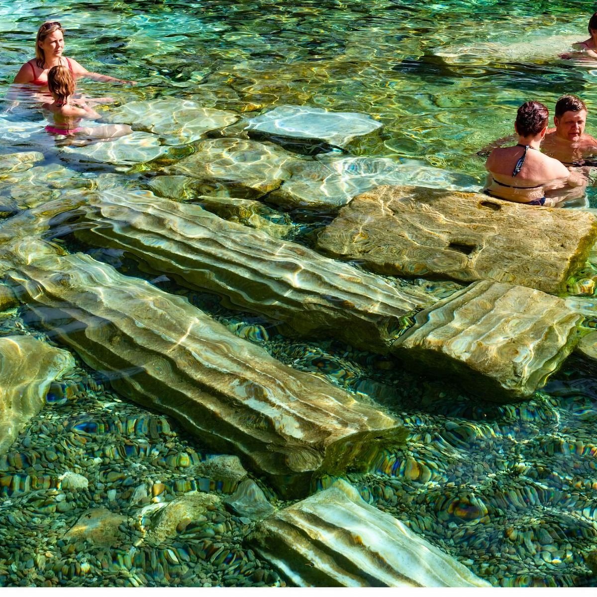 Ancient Cleopatra pool with submerged Roman columns