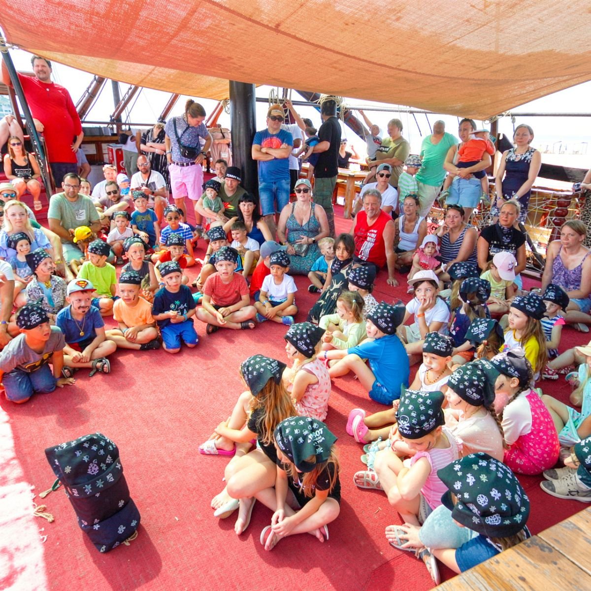 Children in pirate bandanas on board